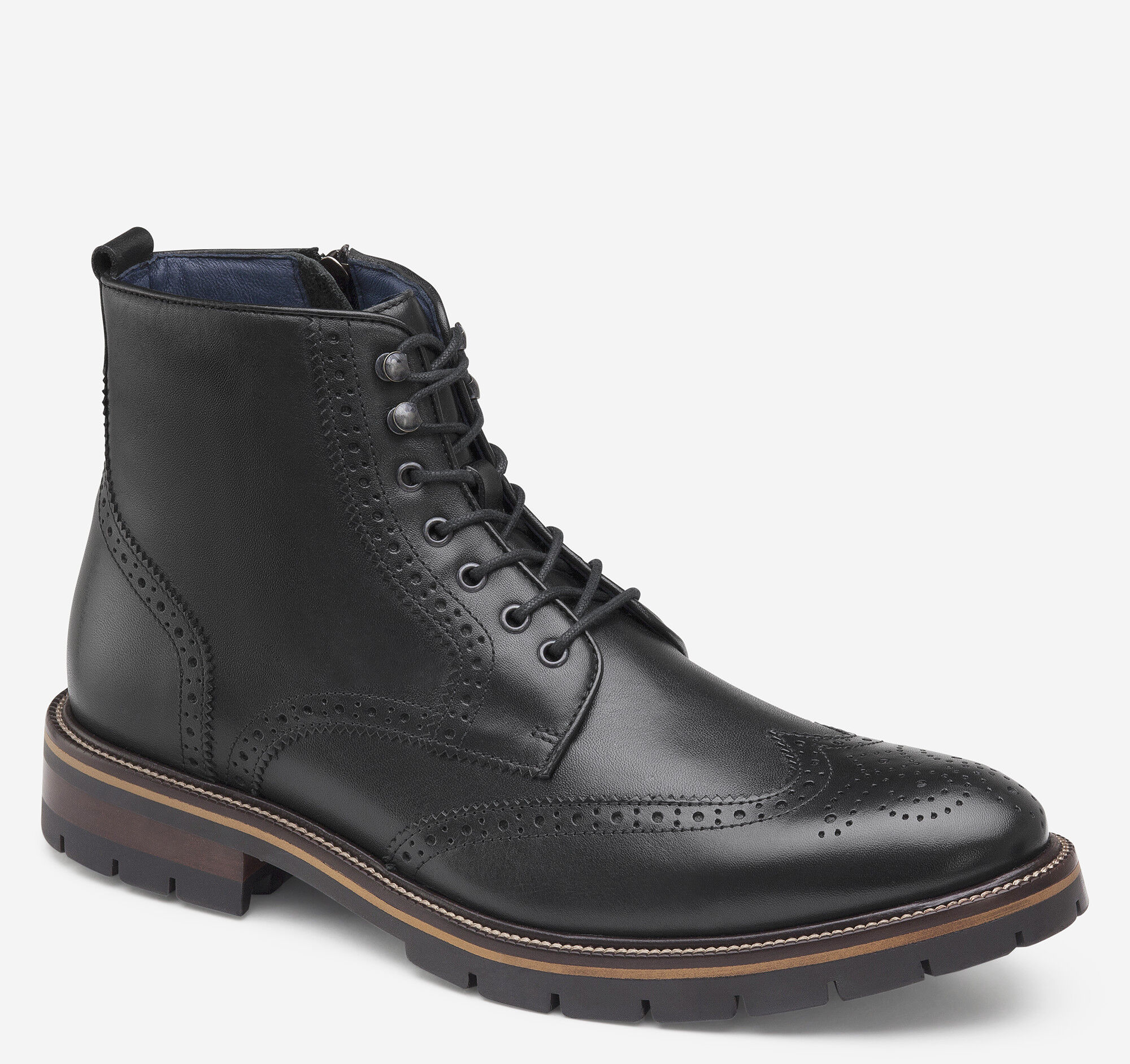 kinley wingtip zip boot